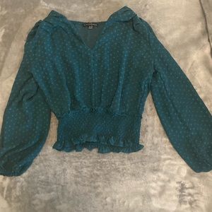 Sheer emerald green blouse. Only worn once. Price negotiable
